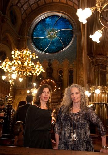 Kiki Smith and Deborah Gans in front of their window in the 1887 Museum at Eldridge Street.  